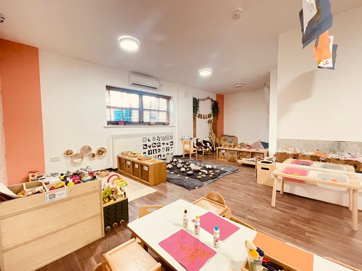 blossoming minds daycare & nursery bright organized play space with toys