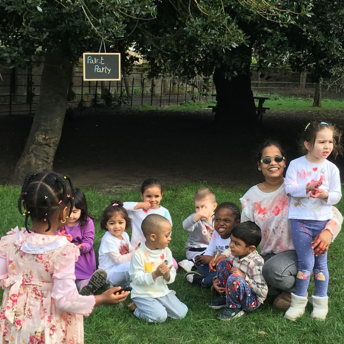 blossoming minds daycare children enjoying paint party outdoors