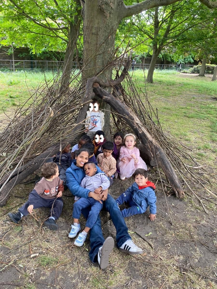 blossoming minds daycare & nursery children in tree shelter