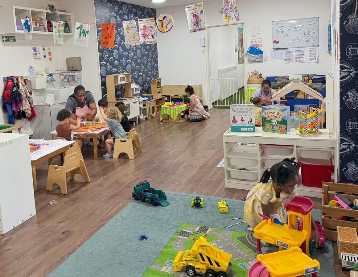 blossoming minds daycare children playing with toys and activities