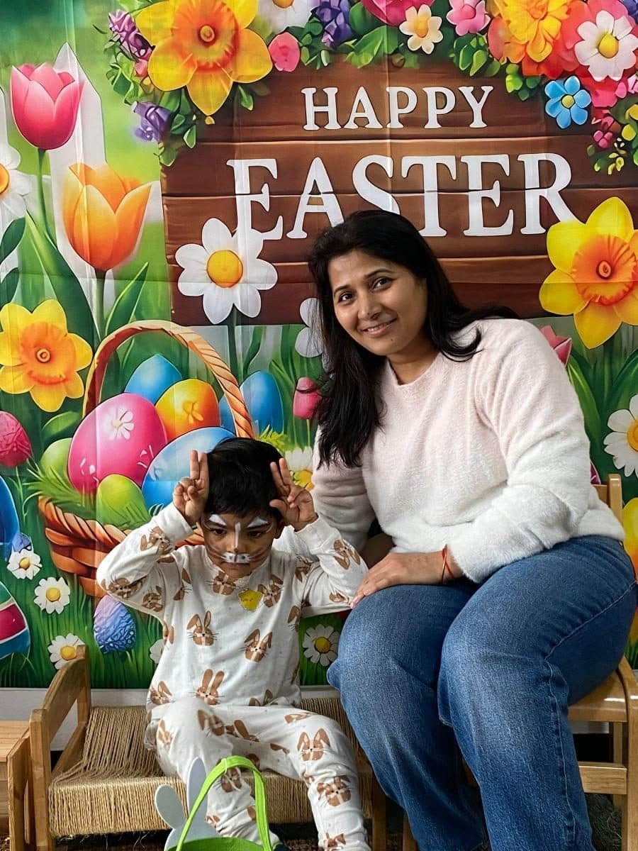 blossoming minds daycare practitioner and child easter celebration
